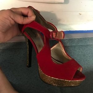 Red heels with gold bottoms